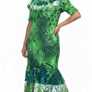 Woman in green patterned ruffled maxi dress