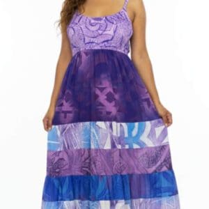 Woman in purple patterned tiered maxi dress