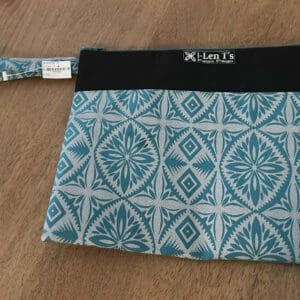 Teal geometric wristlet pouch with strap