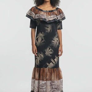 Woman in floor-length patterned ruffled off-shoulder dress