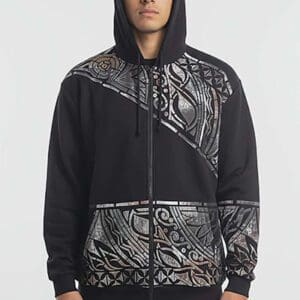 Person wearing black patterned zip-up hoodie