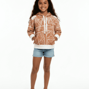 Smiling girl in patterned hoodie and shorts