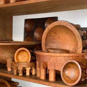 Handcrafted wooden bowls and dishes on shelf