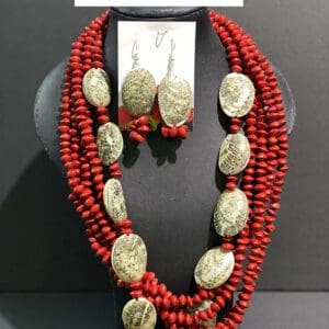 Red beaded jewelry set with marbled ovals